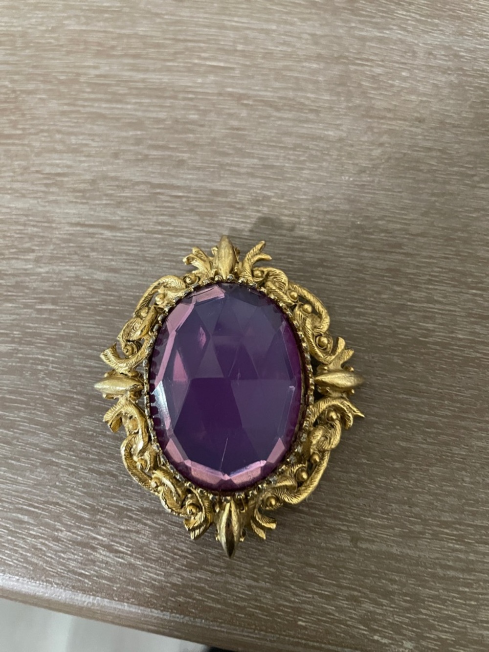 Source Unknown Gold-Tone Brooch with Purple Faceted Glass Stone